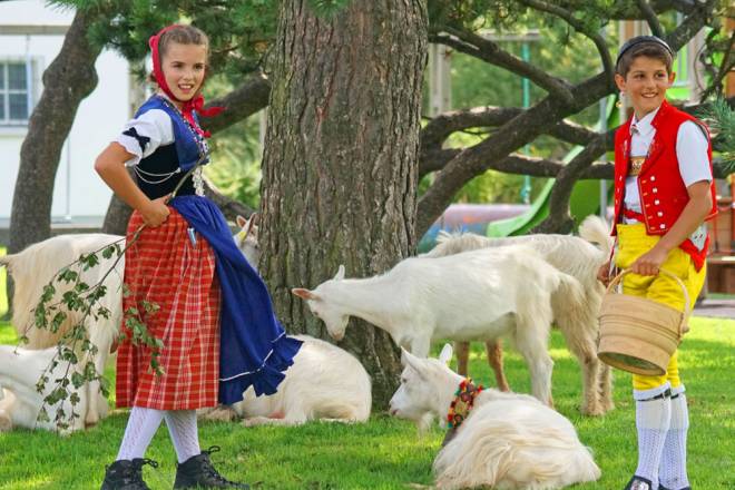 Children in traditionial swiss livery